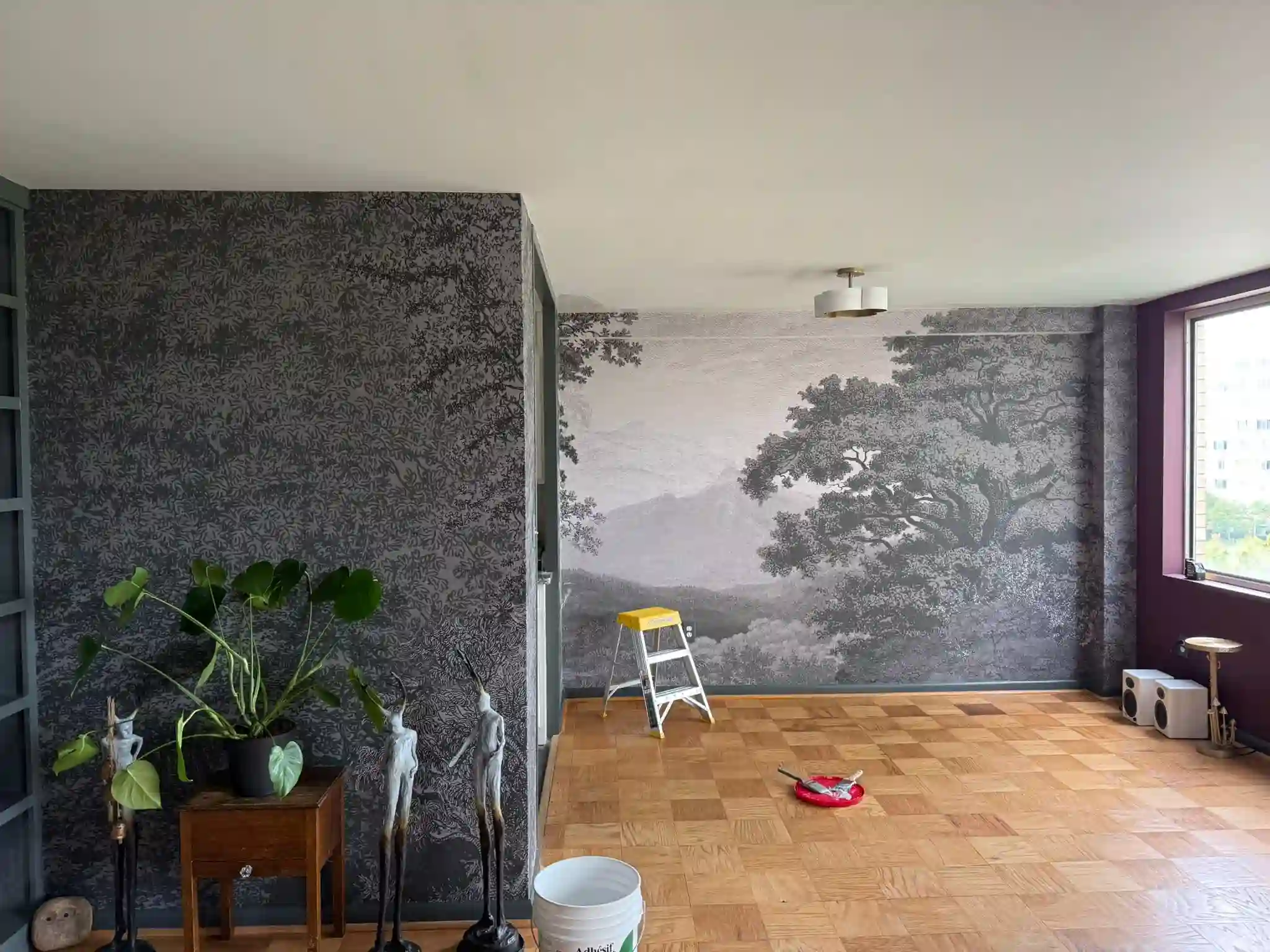 Wallpaper installer at work in Rochester Hills neighborhood Michigan