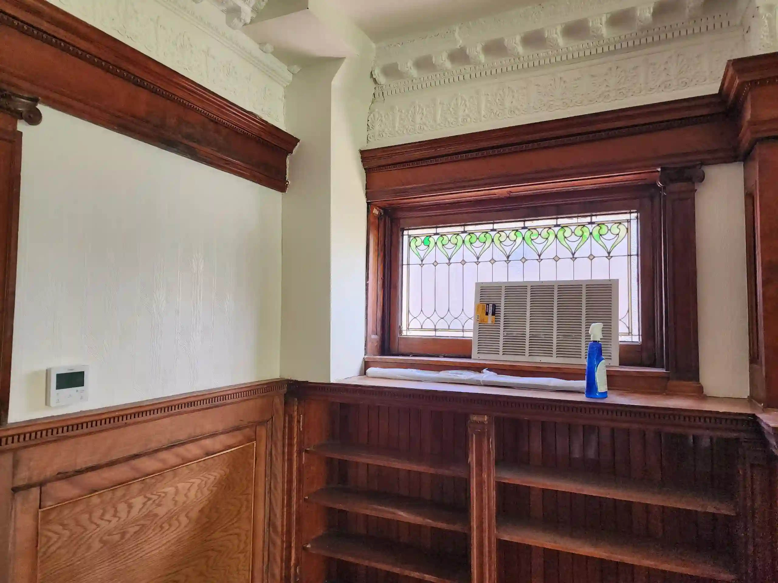 Wallpaper installer at work in Westland neighborhood Michigan