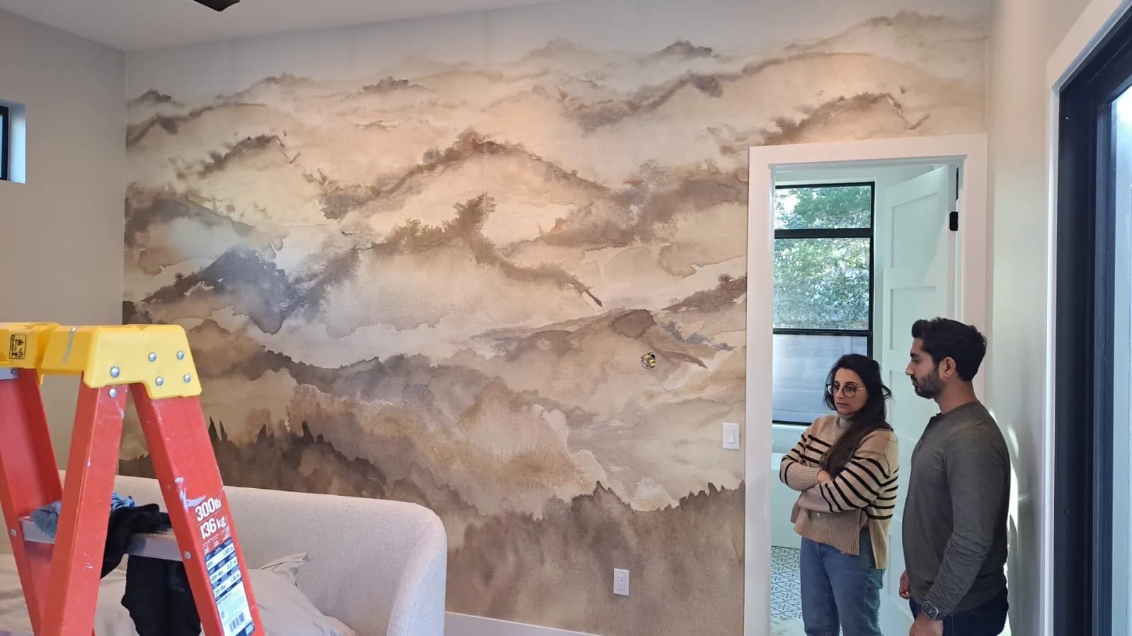 Wallpaper installer at work in Livonia neighborhood Michigan